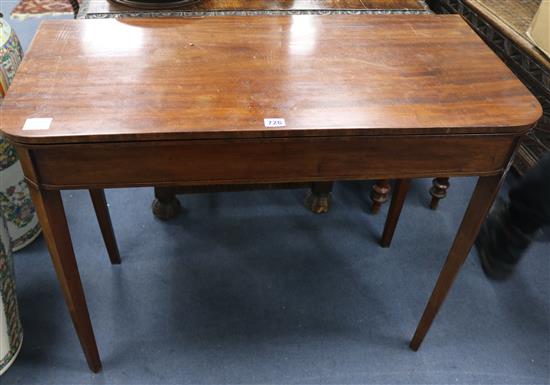 A late Georgian mahogany folding tea table, W.92cm